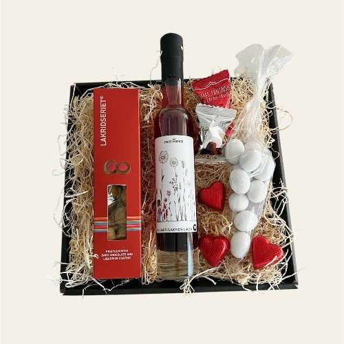 Tillykke gavekurv med likør og søde sager